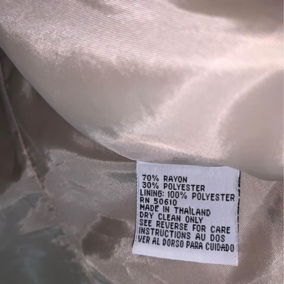 Lovely tan suit. - Picture 5 of 9